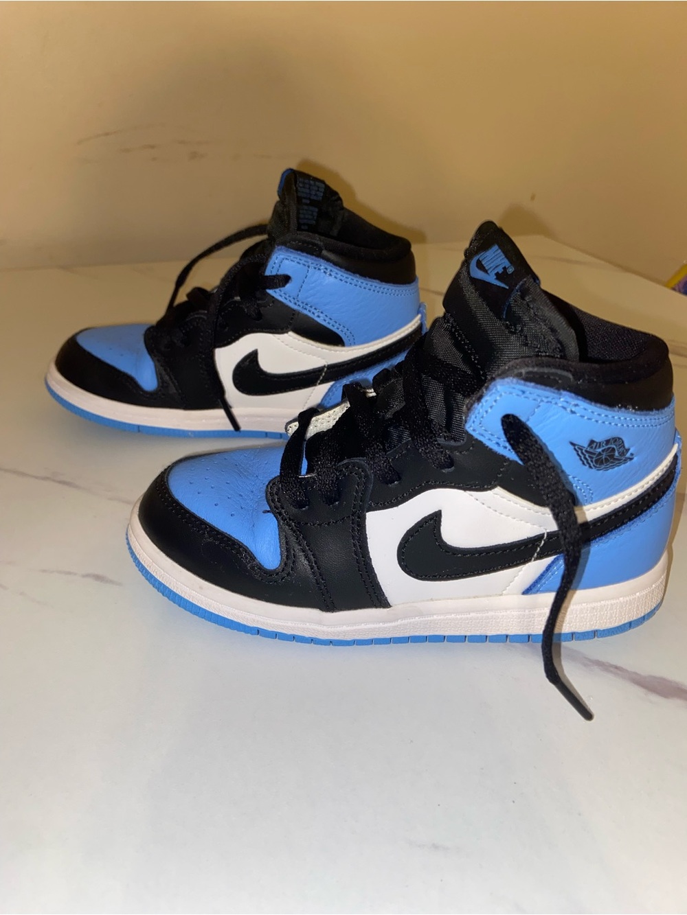 Jordan Kids' High-Top Sneakers in University Blue/Black/White